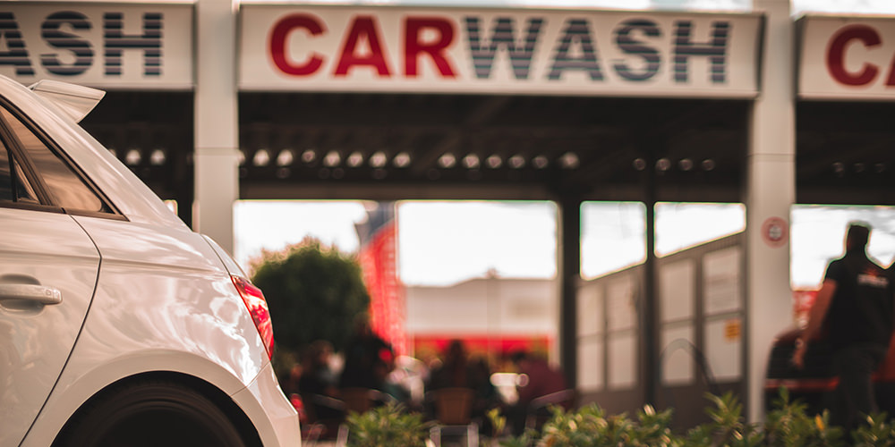 a car stop ahead of the car wash